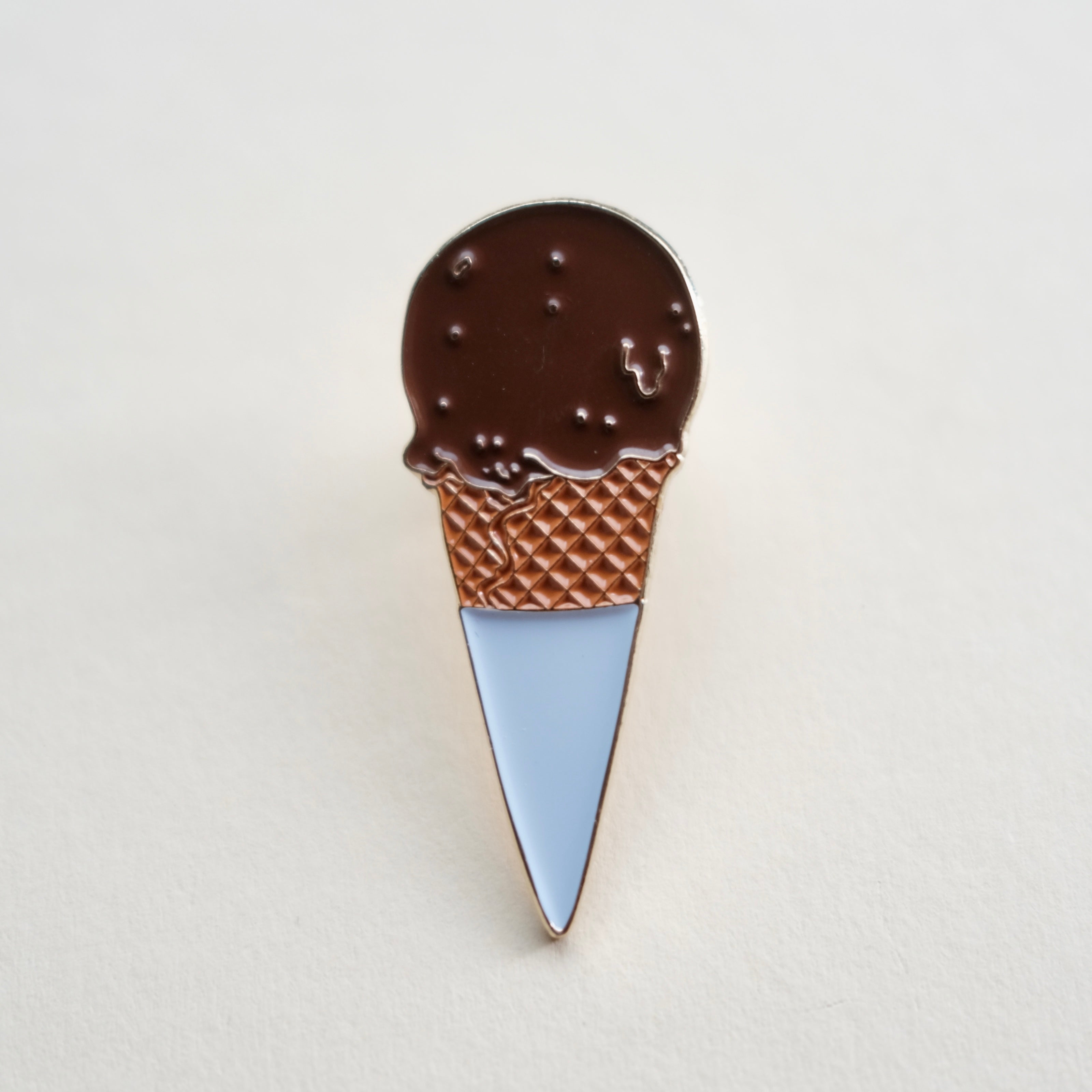 Embrace Timeless Indulgence with Our Chocolate Cone Pin!